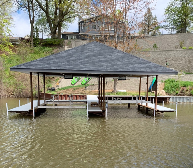 Boat Docks with house behind it